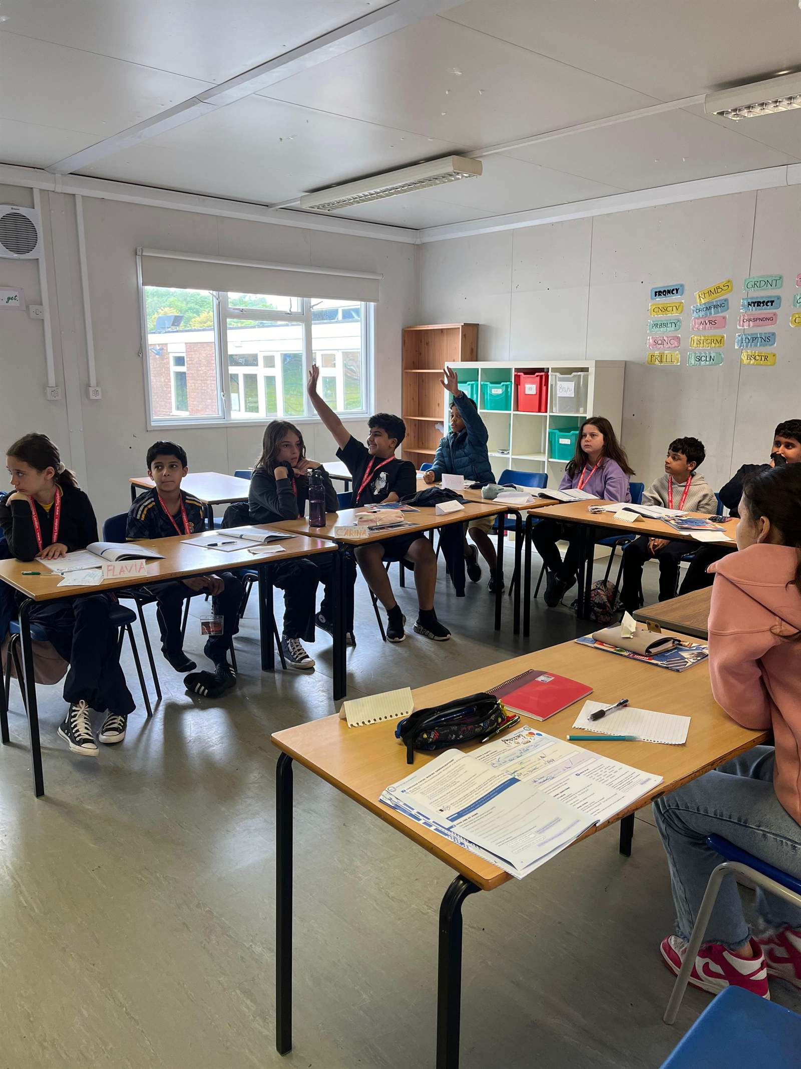 Students in a classroom during a learning activity in London